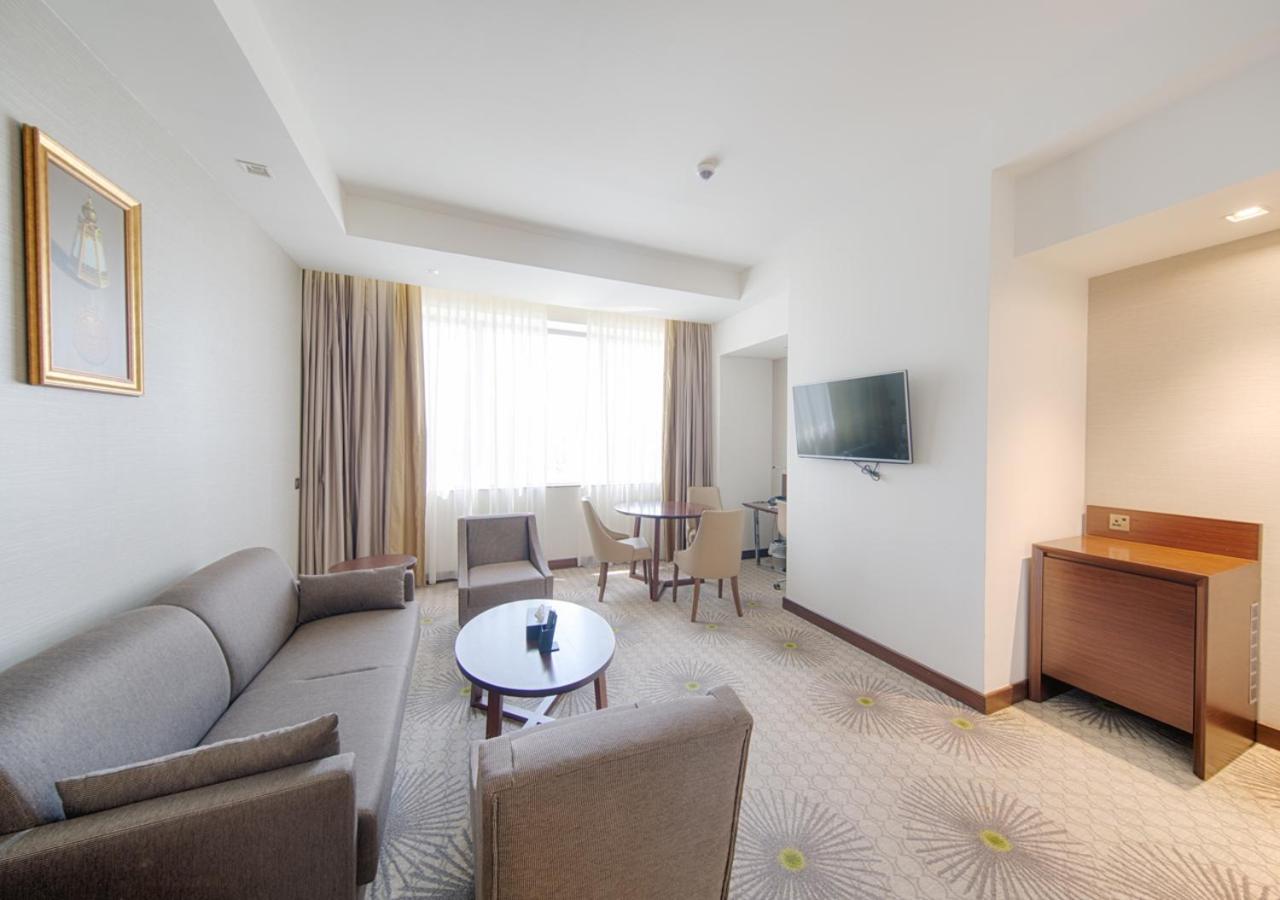 Holiday Suites Al Azizia Mekka Zewnętrze zdjęcie A room at the hotel