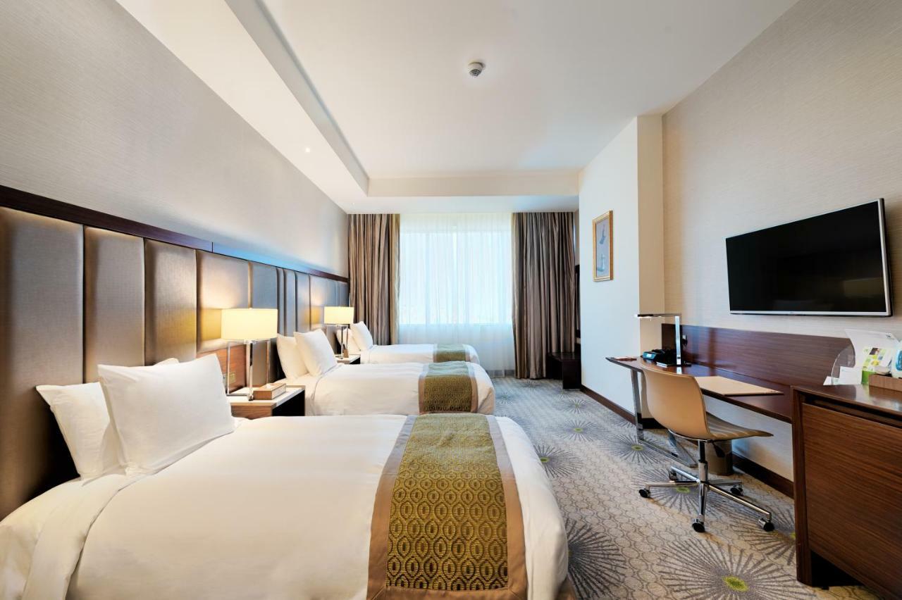 Holiday Suites Al Azizia Mekka Zewnętrze zdjęcie A room at the hotel